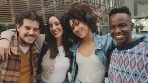 Preview: Close up, young smiling people posing while standing on the street