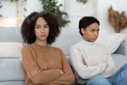 Preview: Conflict between two best friends. Women crossed arms, sitting on floor and looking in different
