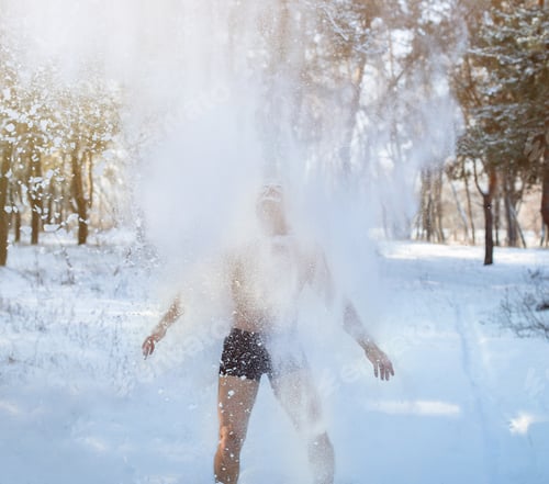 Preview: Winter fun and tempering procedures. Senior guy throwing snow on himself, developing resistance to
