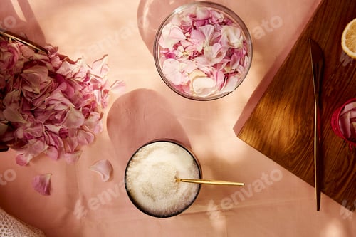 Preview: Aesthetic homemade organic rustic jam preparing with sugar, lemon and tea rose petals.