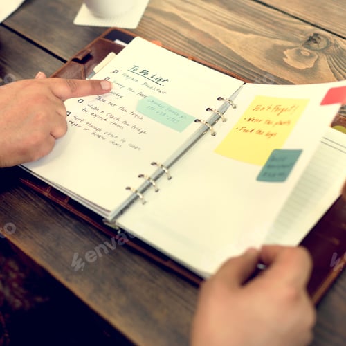 Preview: Indian Couple Checking To Do List Concept