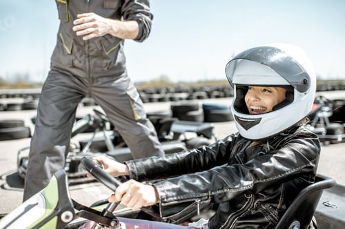 Preview: Man instructing woman before racing