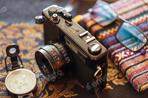 Preview: Vintage camera on a decorative table