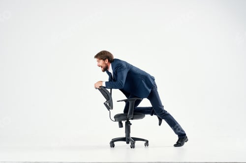 Preview: business man in a suit rides in a chair emotions work manager