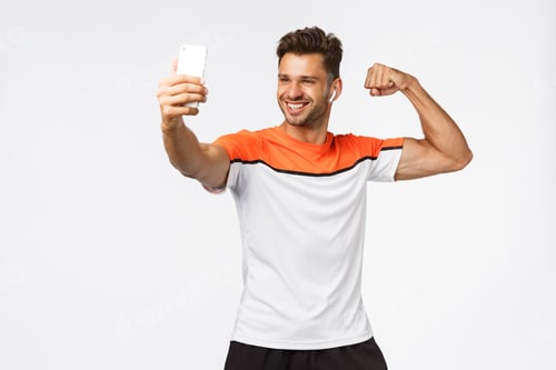 Preview: Smiling Man Taking Selfie Showing His Biceps