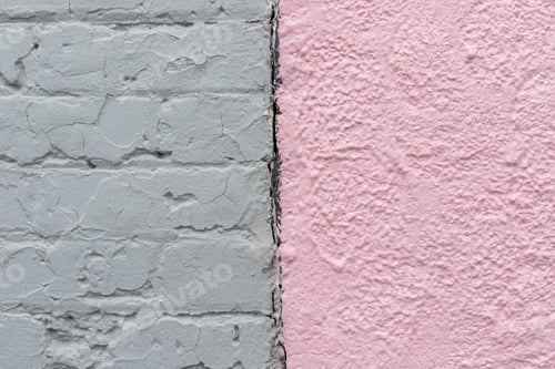 Preview: Light pastel pink stone and grey brick painted wall texture background close-up.