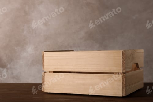 Preview: Wooden crate on table against color background. Space for text