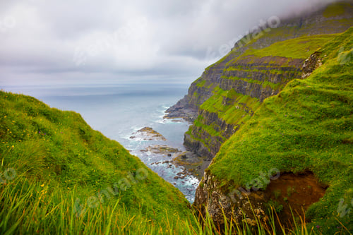 Preview: Dramatic landscape on a cloudy day at Faroe Islands