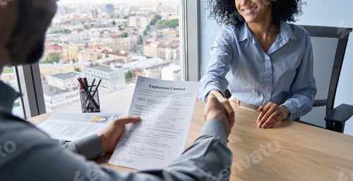 Preview: Newcomer worker female African American and Indian ceo shaking hands.