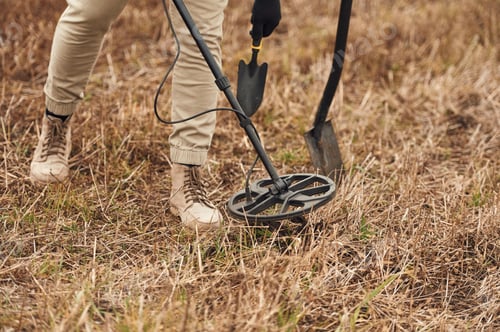 Preview: Sensitive sensor, searching. Man is with metal detector in the field