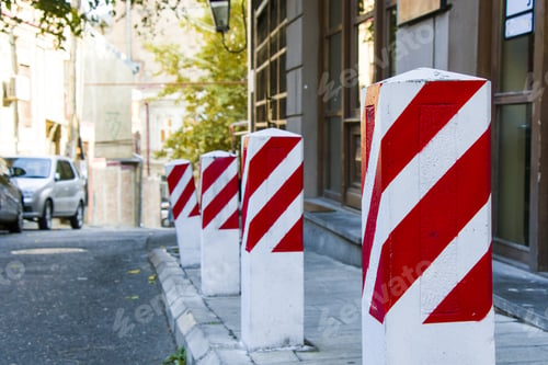 Preview: Selective focus of red lines on the street posts in Tbilisi, Georgia