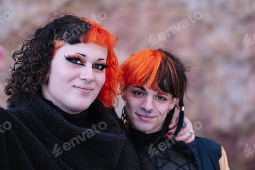 Preview: Couple of transgender girl and boy looking at camera.
