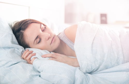 Preview: Girl peacefully sleeping in the morning before waking up