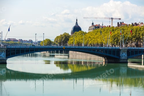 Preview: Cityscape of Lyon, France with reflections in the water