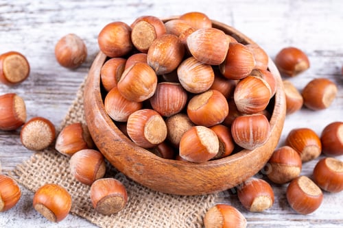 Preview: Shelled Hazelnuts is important for health on the wooden background
