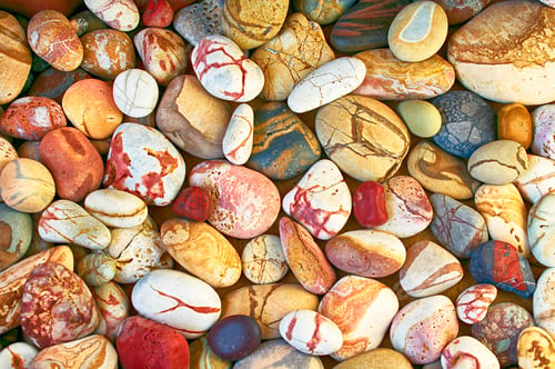 Preview: Set of beautiful colorful stones with different pattern polished by the sea
