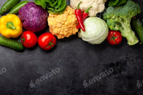 Preview: Various fresh vegetables on kitchen table