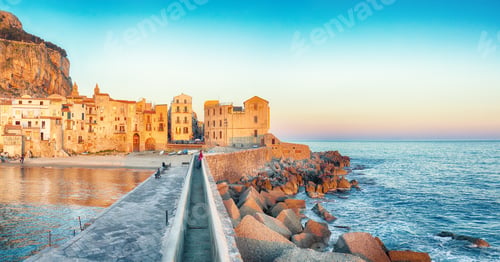 Preview: Scenic evening cityscape of Cefalu city.