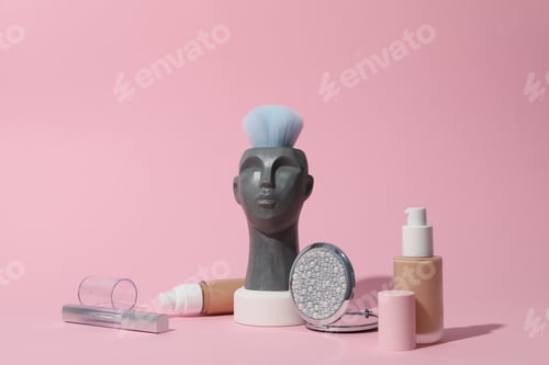 Preview: Makeup concept with decorative head on pink background