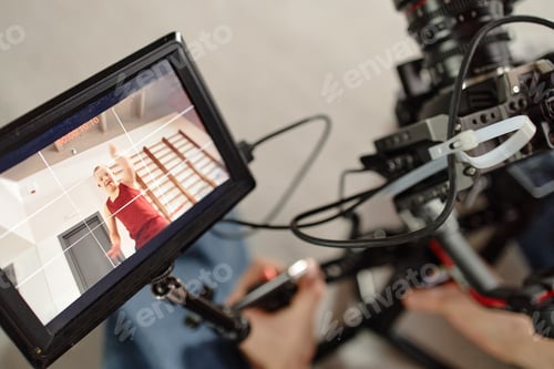 Preview: Child with Down Syndrome Smiling While Filming Video Indoors
