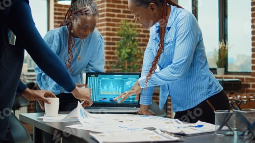 Preview: Workers discussing about annual reports