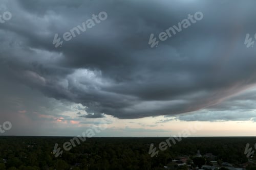 Preview: Landscape of dark ominous clouds forming on stormy sky before heavy thunderstorm