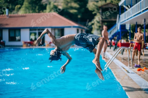 Preview: The boys are having fun near the pool.