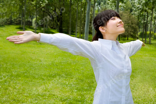 Preview: Asian woman on grass