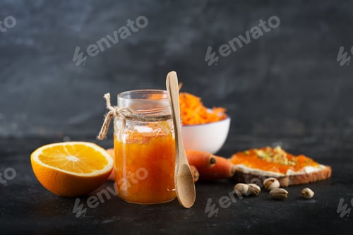 Preview: Carrot Jam with orange juice on a black background