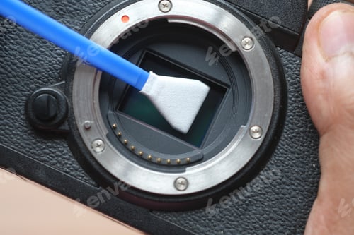 Preview: close up of cleaning camera sensor,