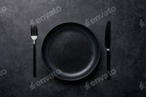 Preview: Empty plate, fork and knife