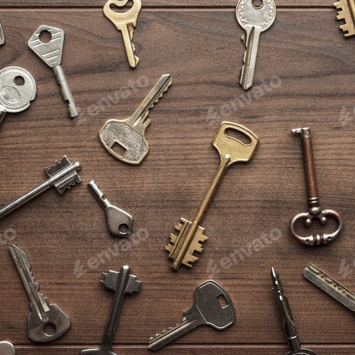 Preview: Many Different Keys On Wooden Table