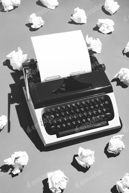 Preview: Oldschool typewriter and creased paper.
