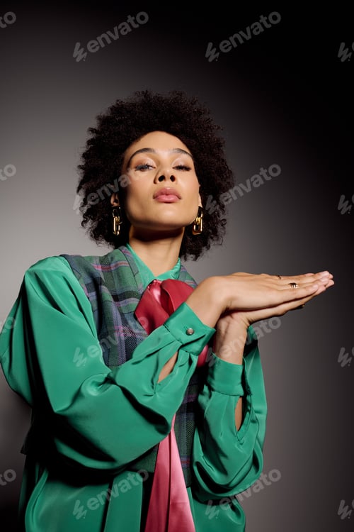 Preview: Striking young woman showcases fashion style with confidence and elegance in studio setting