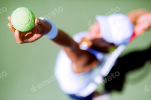Preview: Beautiful female tennis player serving