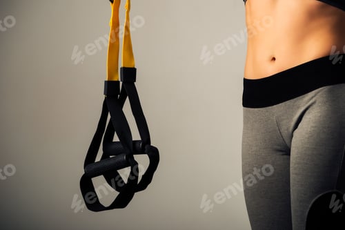 Preview: Close-up flat female belly and the hanging straps