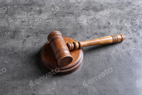 Preview: Judge's gavel on grey background. Law concept