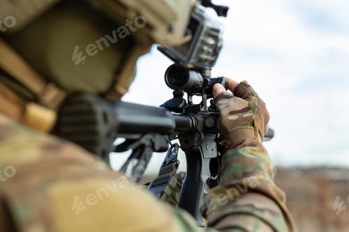 Preview: Infantry soldier shooting during military combat training.