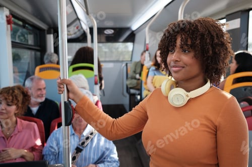 Preview: Young woman enjoying public transit travel on bus