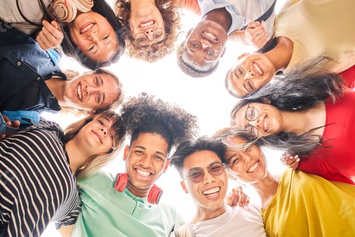Preview: Low angle of a group of students are together, happy and smiling. Faces of young teen
