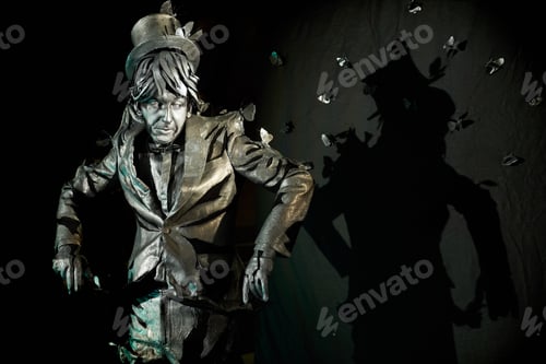 Preview: Professional mime posing at camera during creative process