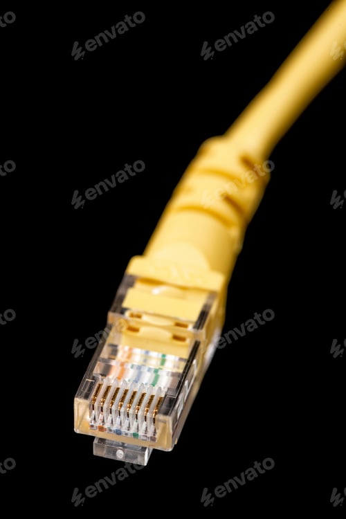 Preview: Macro image of yellow network plug over black background. Fiber optic.