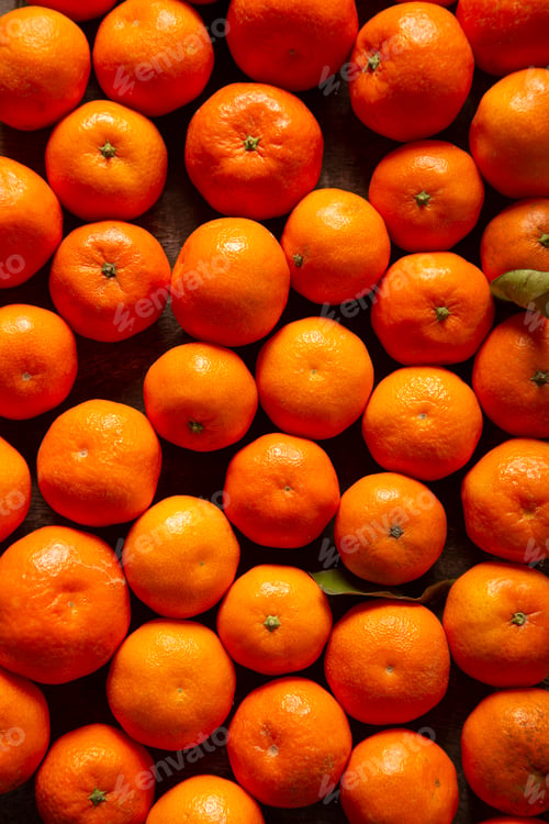 Preview: Fresh and ripe tangerines, orange background, tangerine background fruit, vitamin c, tropical fruit.