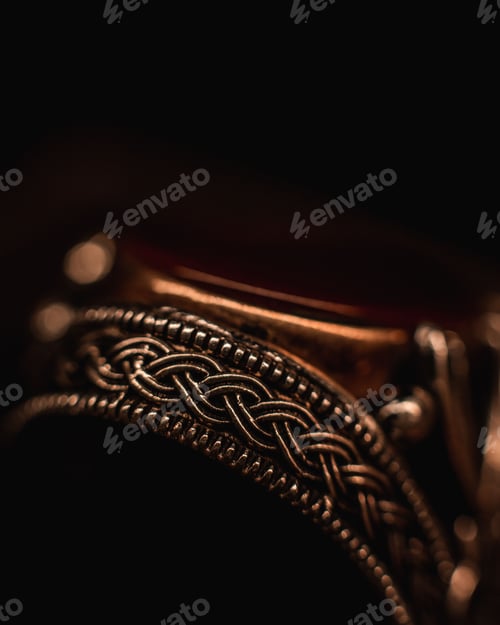 Preview: Closeup shot of the details of a ring on black background