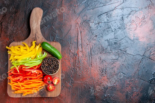 Preview: top view colorful cut peppers black pepper tomatoes cucumber on cutting board on dark red table with