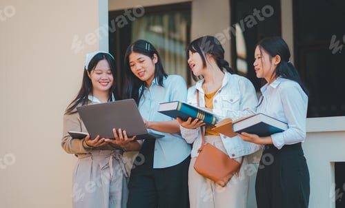 Preview: group of students young university students consulting doing homework