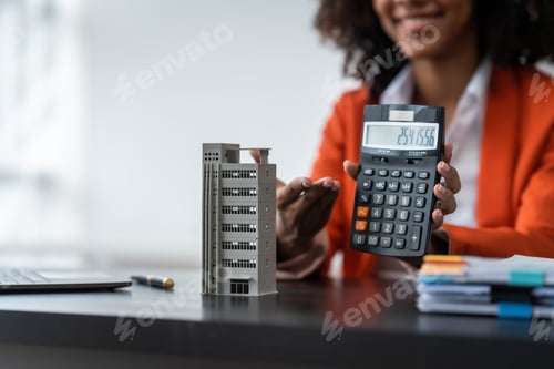 Preview: African American realtor working at desk, Housing estate, Vacancy, Prime location, Low Rise