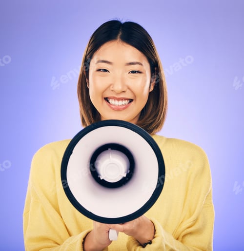 Preview: Woman, megaphone and happy portrait in studio for announcement, voice or broadcast. Face of a young