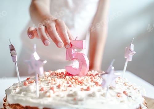 Preview: Big pink 5 number candle on homemade cake. Creative congratulations on five years for child girl.