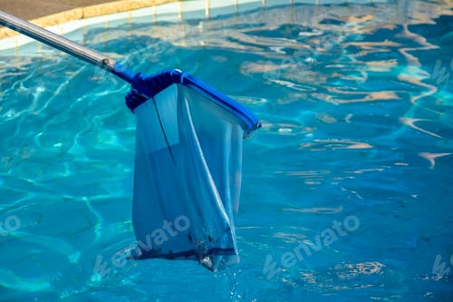 Preview: Cleaning pool from garbage with special net. Clear water with blue tint Concept of healthy lifestyle